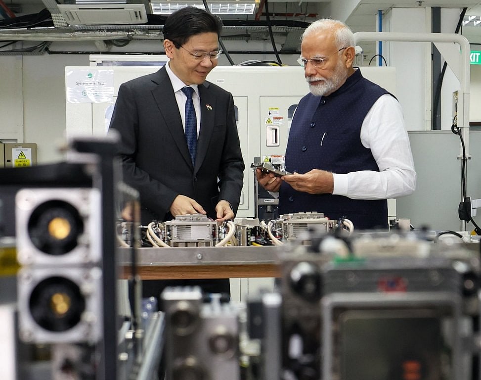 Singaporean PM Lawrence Wong (left) and Indian PM Narendra Modi at the semiconductor facility. Photo courtesy: x.com/MEAIndia
